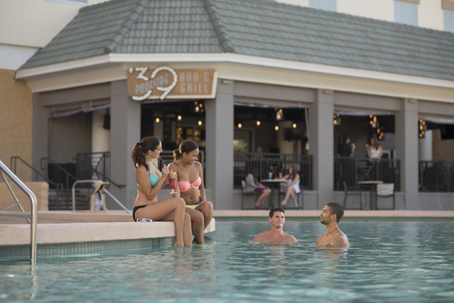 Mocktails in Orlando - Friends hanging out in swimming pool at '39 Poolside