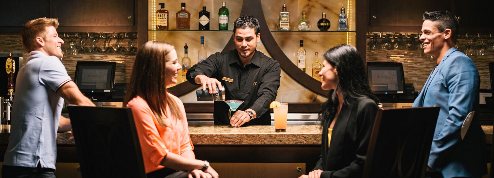 Jack's Lounge Bartender serving drinks